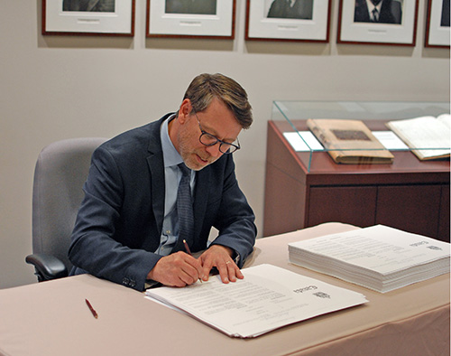 Chief Electoral Officer Stéphane Perrault signs the writs for the 43rd general election